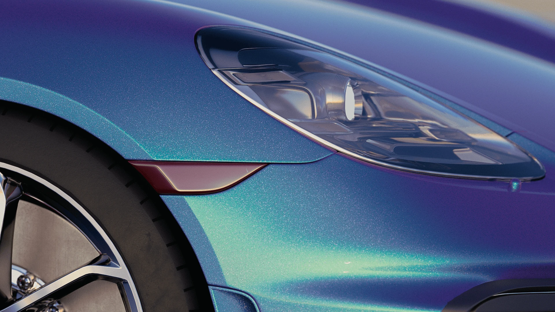 Close front fender and headlight detail with cyan, violet and green reflections