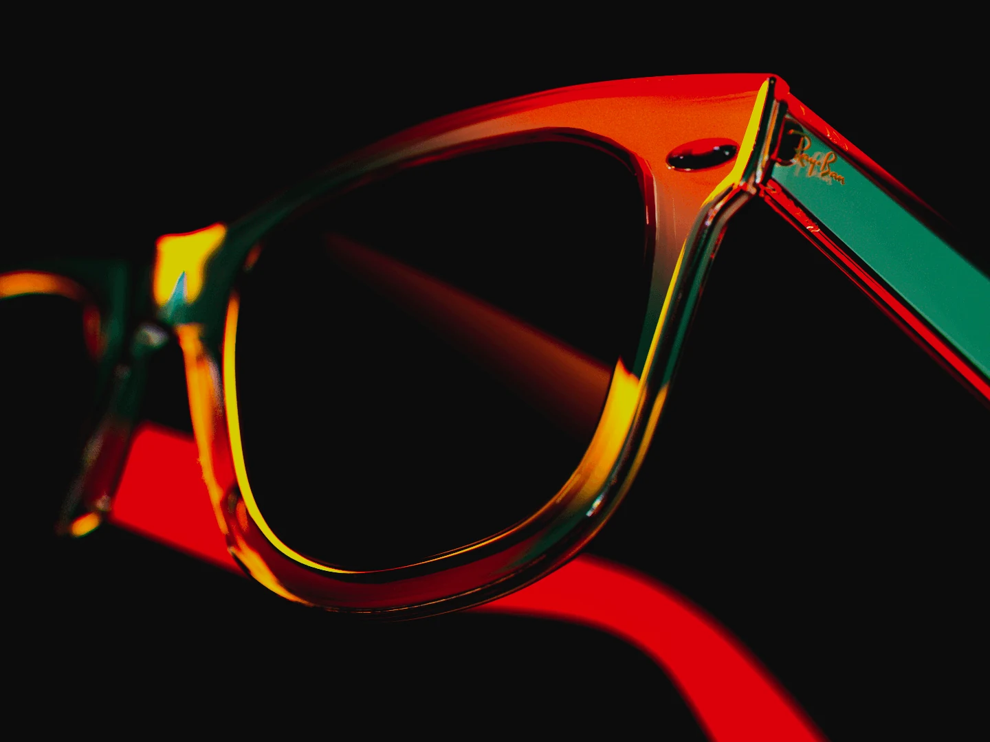 Ray-Ban acetate sunglasses lit in red, green and gold